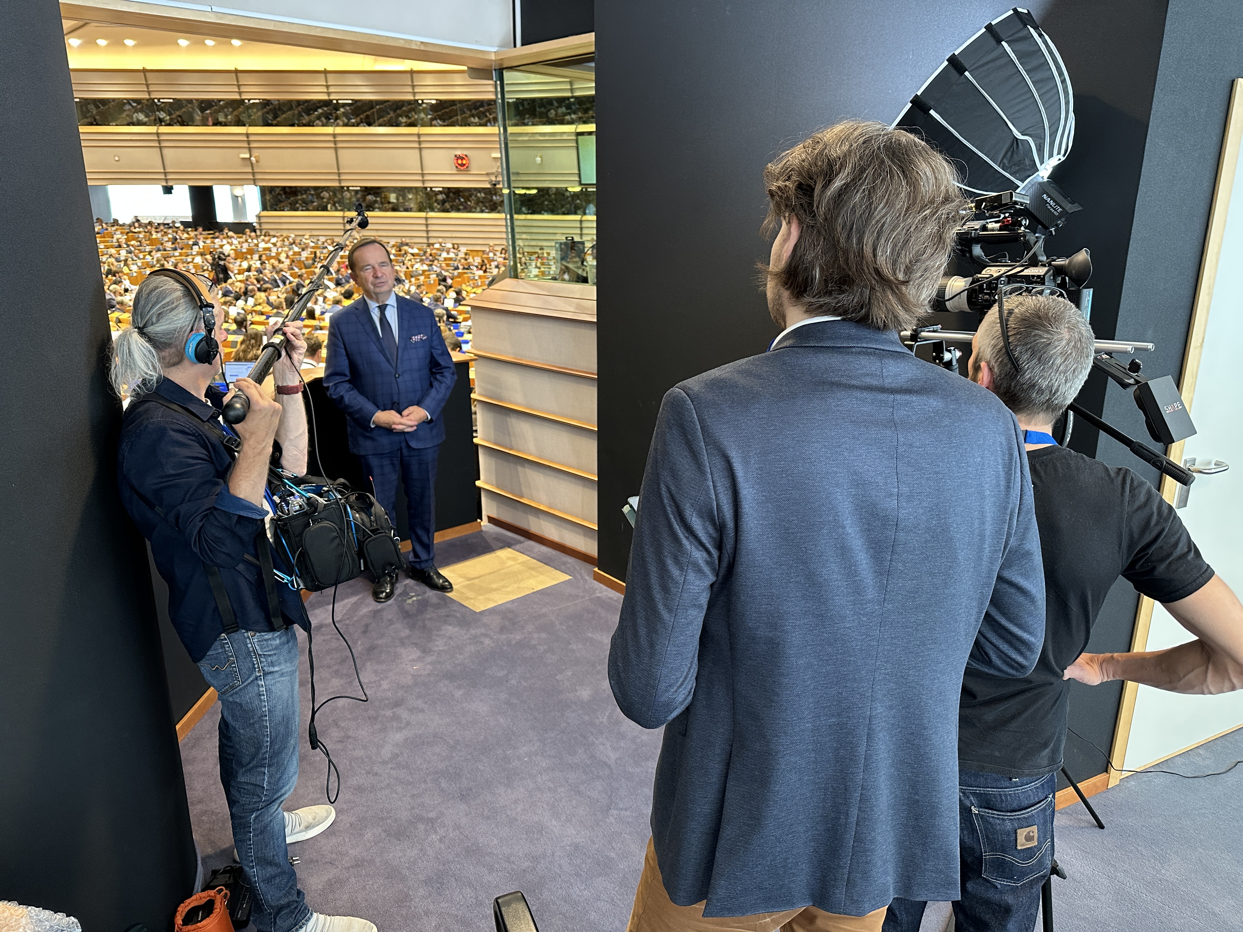 Fullscreen Productions filming an official statement with a high-level EU personality in a European Parliament session room