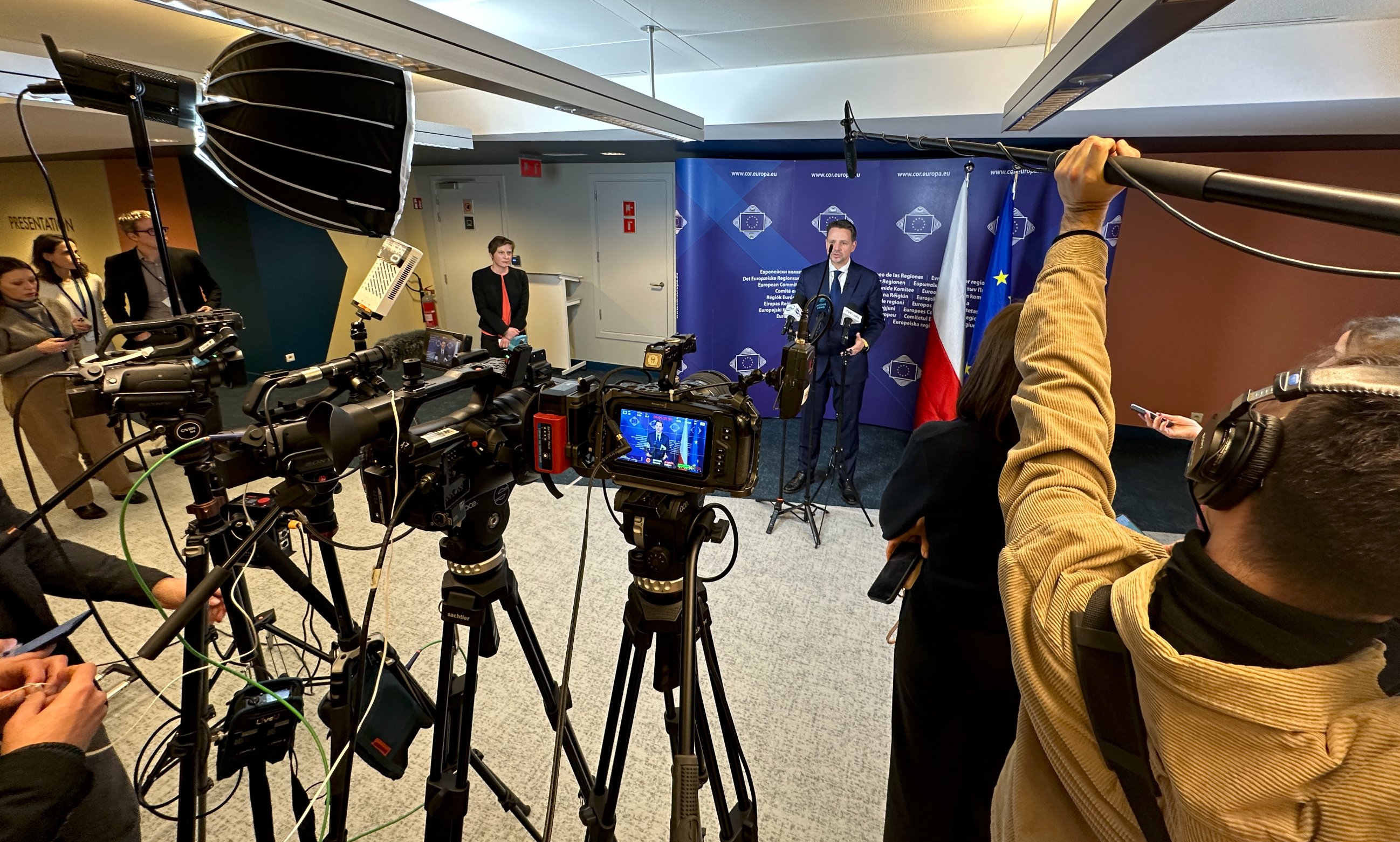 Fullscreen Productions filming a press conference at the European Committee of the Regions, Brussels